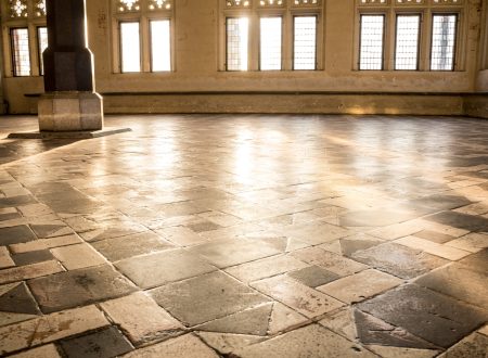 A closeup shot of a church interior with ceramic floor